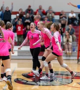 Riverside celebrates a hard earned point against Deer Park.